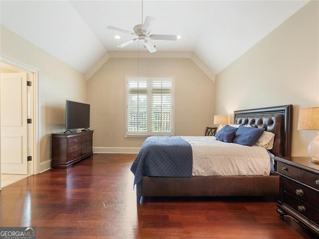 bedroom featuring vaulted ceiling, ceiling fan, and dark hardwood / wood-style flooring