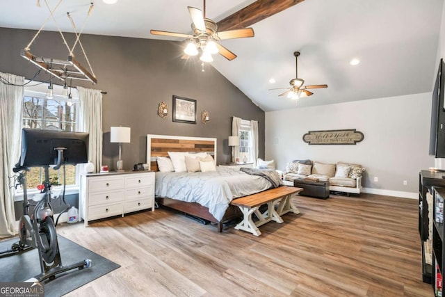 bedroom featuring ceiling fan, high vaulted ceiling, wood-type flooring, and beamed ceiling