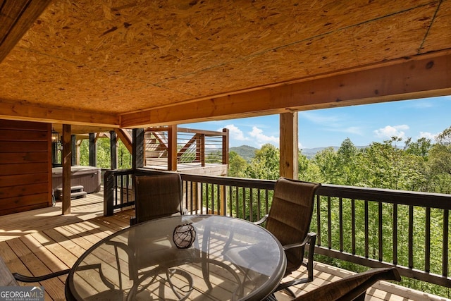 851 Moreland Dr N, Blue Ridge, GA 30513 - wooden deck featuring a mountain view, outdoor dining area, and a hot tub