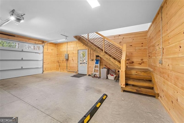 851 Moreland Dr N, Blue Ridge, GA 30513 - garage with a garage door opener and wooden walls
