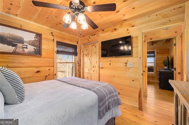 851 Moreland Dr N, Blue Ridge, GA 30513 - bedroom featuring wooden walls, wood ceiling, ceiling fan, and light wood-style floors