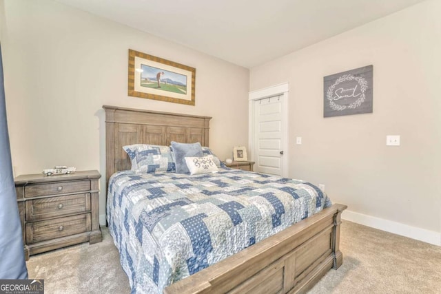 bedroom featuring light carpet