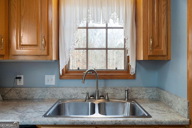 kitchen featuring sink and a wealth of natural light