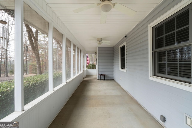 sunroom / solarium with ceiling fan