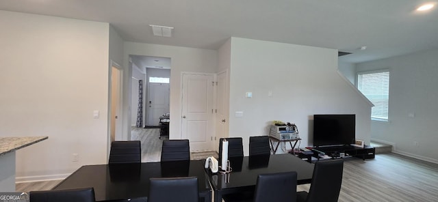 dining area featuring light hardwood / wood-style flooring