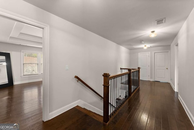 hall with dark hardwood / wood-style floors