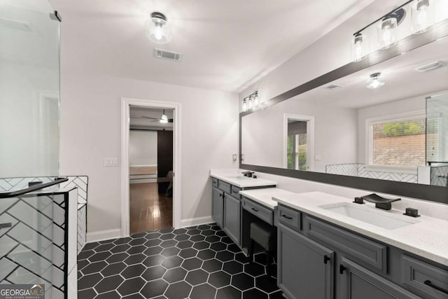 6514 Lemon Grass Ln, Flowery Branch, GA 30542 - full bath featuring double vanity, tile patterned floors, and ceiling fan