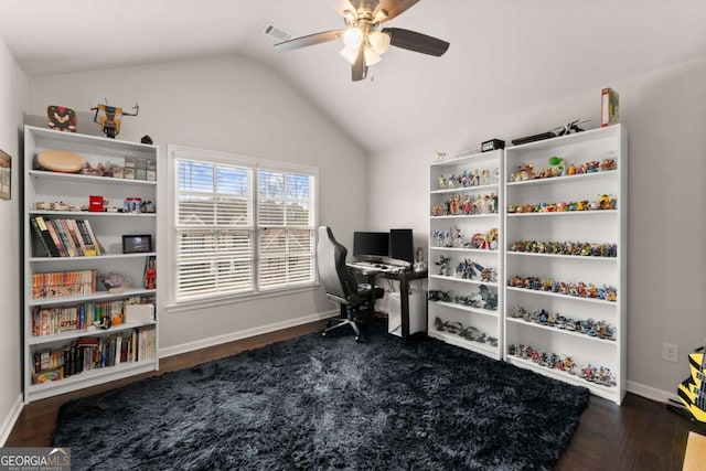 home office with lofted ceiling, dark wood-type flooring, and ceiling fan