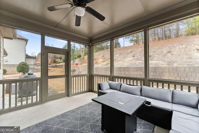 sunroom / solarium with ceiling fan and plenty of natural light