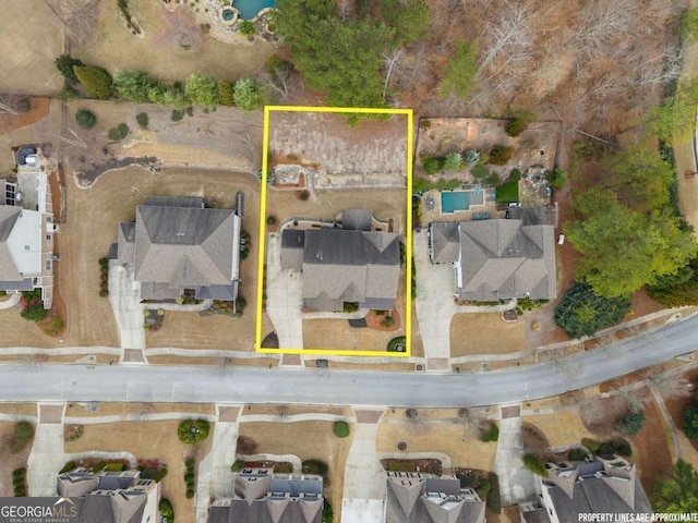 6514 Lemon Grass Ln, Flowery Branch, GA 30542 - aerial perspective of suburban area with property parcel outlined