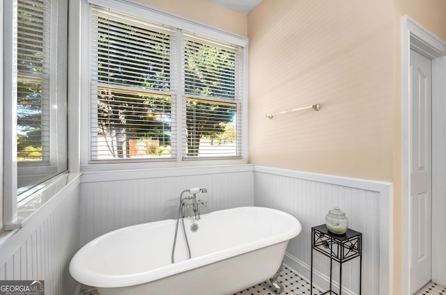 carpeted bedroom with baseboards, visible vents, ceiling fan, and vaulted ceiling