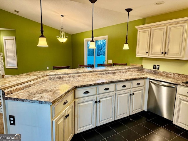 kitchen featuring decorative light fixtures, stainless steel dishwasher, and kitchen peninsula