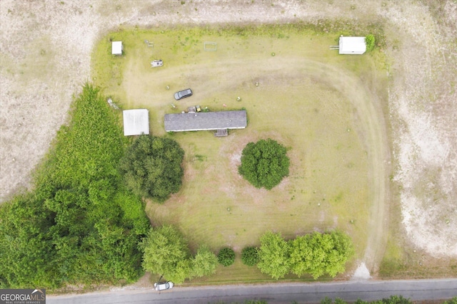 birds eye view of property featuring a rural view