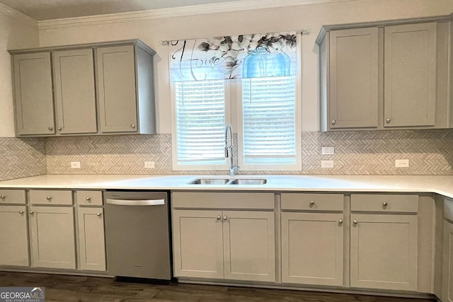 kitchen with sink, crown molding, gray cabinets, and stainless steel dishwasher