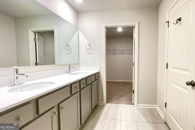 bathroom with vanity and tile patterned floors