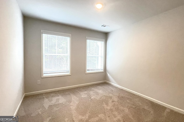 empty room with carpet floors