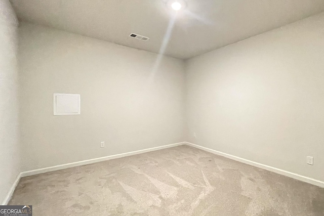 spare room with carpet floors