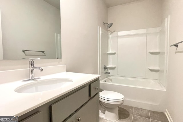 full bathroom with tile patterned flooring, vanity, shower / bathing tub combination, and toilet