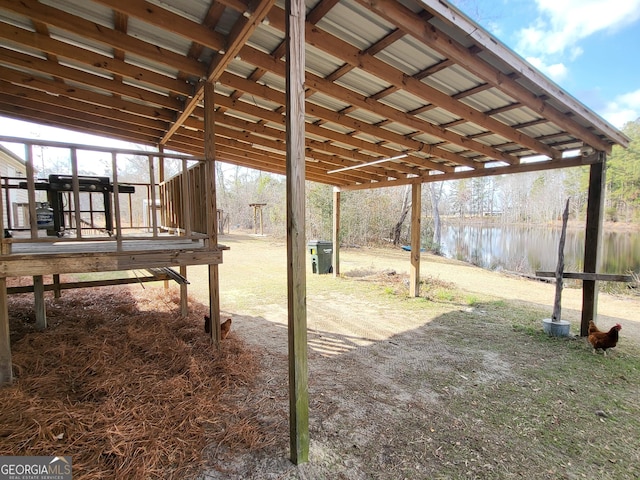 view of patio with a water view