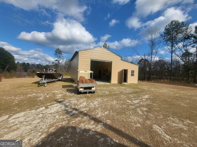 view of outdoor structure featuring a garage