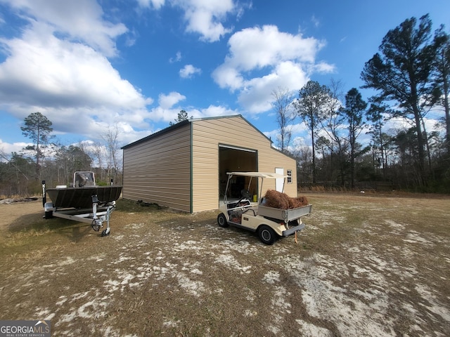 view of outbuilding featuring a garage