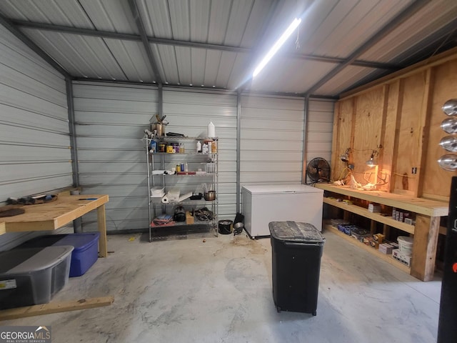 garage featuring fridge