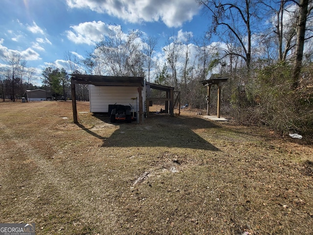 view of yard featuring a carport