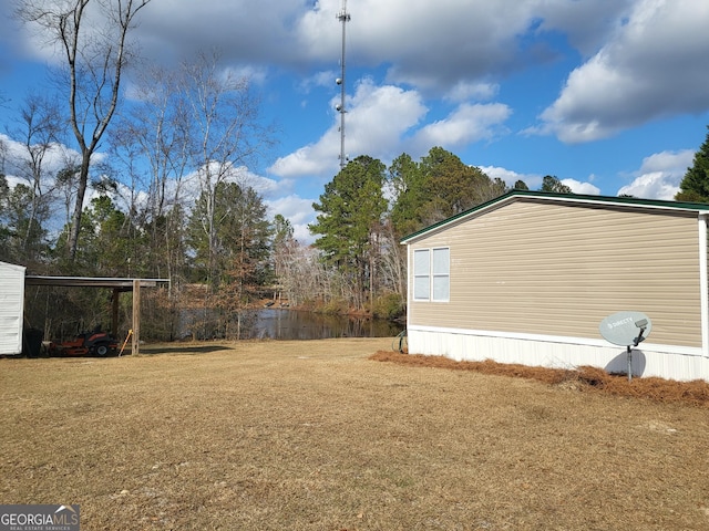 view of yard featuring a carport