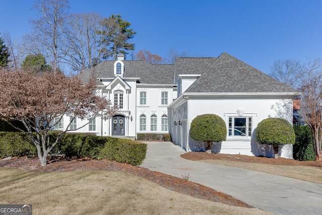 view of front property with a front lawn