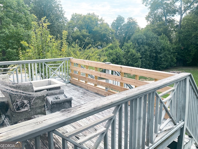 deck with an outdoor hangout area