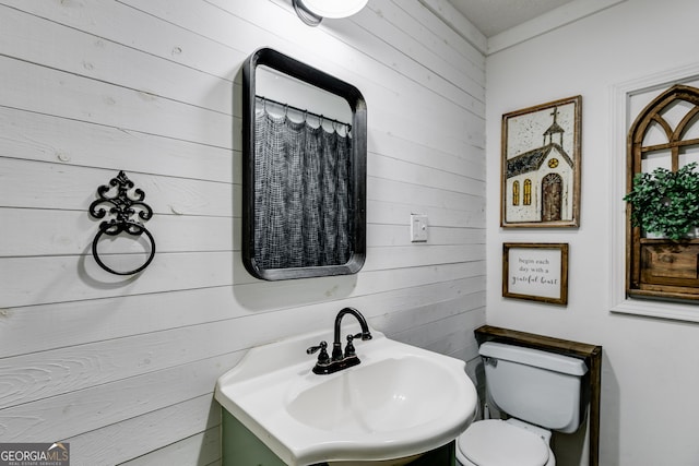 bathroom with toilet and sink