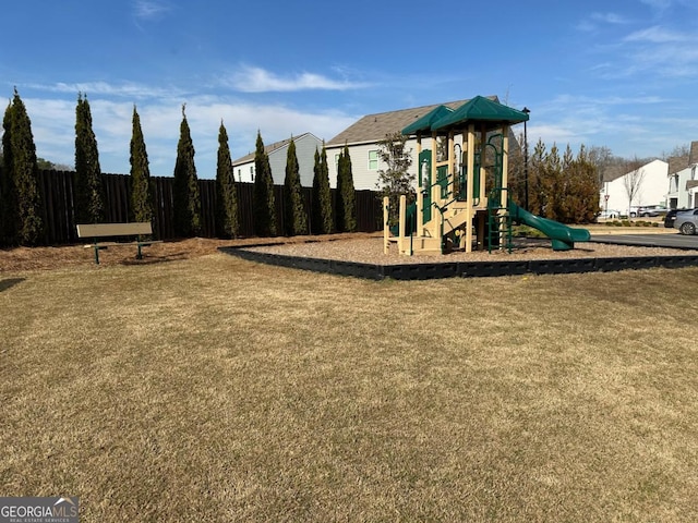 view of play area featuring a lawn