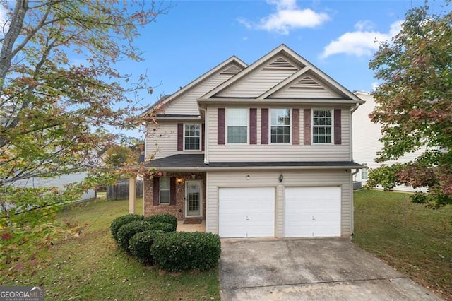 view of front of house with a garage and a front yard