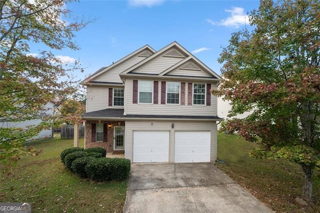 view of front of property with a garage and a front yard