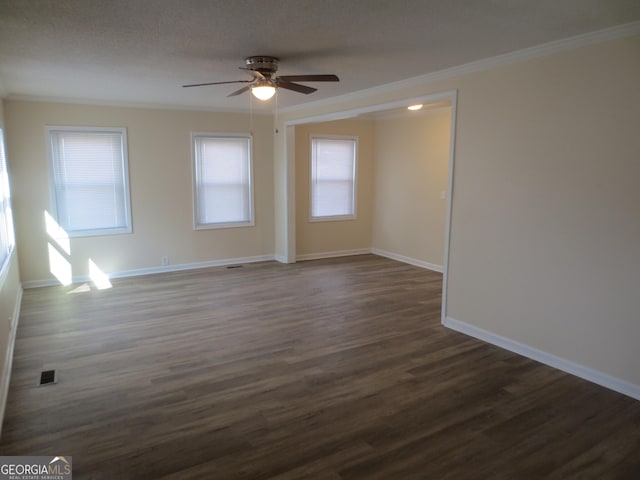 unfurnished room featuring crown molding, ceiling fan, and dark hardwood / wood-style flooring