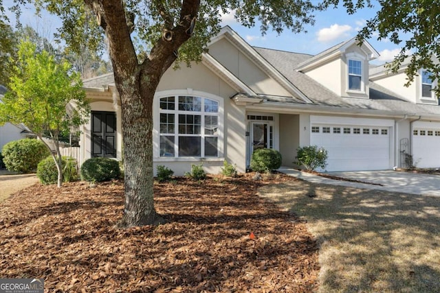 view of front of property with a garage