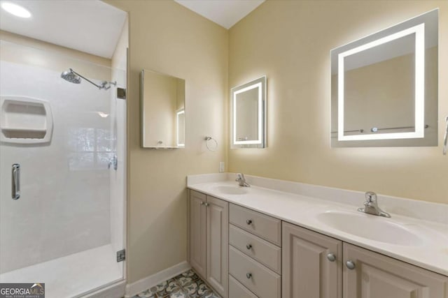 bathroom featuring vanity and a shower with shower door