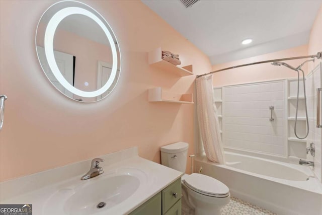 full bathroom with shower / tub combo with curtain, vanity, and toilet