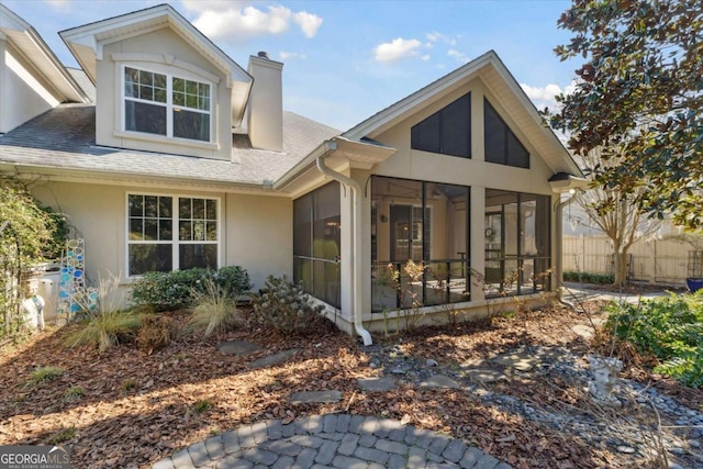 exterior space with a sunroom