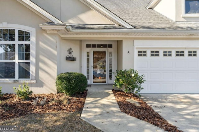 property entrance with a garage