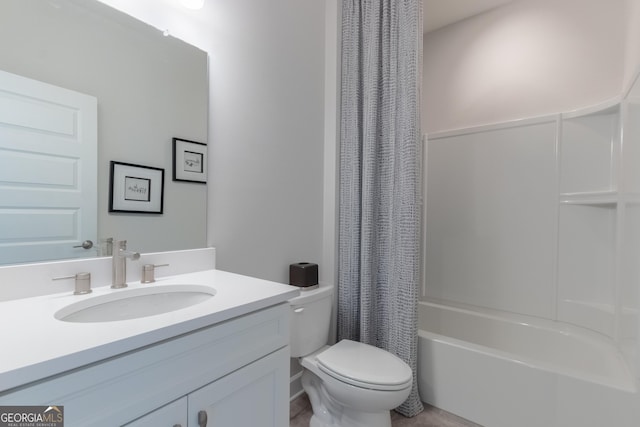 full bathroom with vanity, toilet, and shower / bath combo with shower curtain