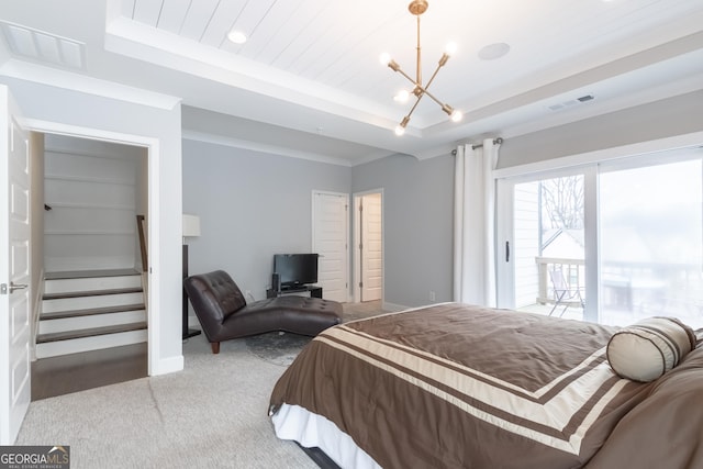 carpeted bedroom with wood ceiling, crown molding, access to exterior, a raised ceiling, and a chandelier