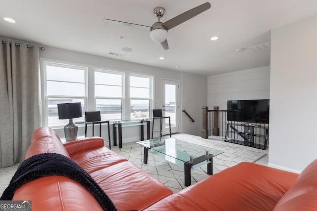 living room with ceiling fan