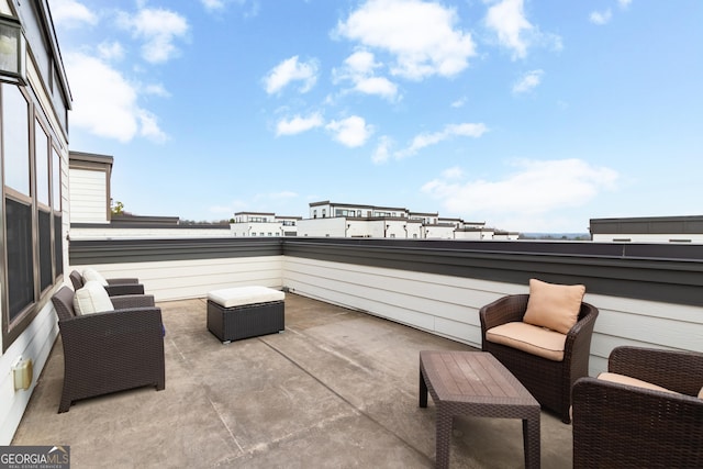 view of patio / terrace with a balcony