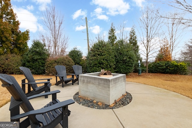 view of patio featuring an outdoor fire pit