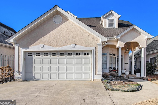 view of front of home featuring a garage