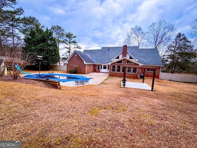 exterior space with a patio and a water slide