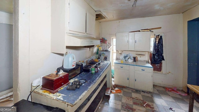 kitchen with white cabinets