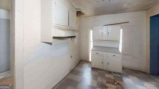 kitchen with white cabinetry