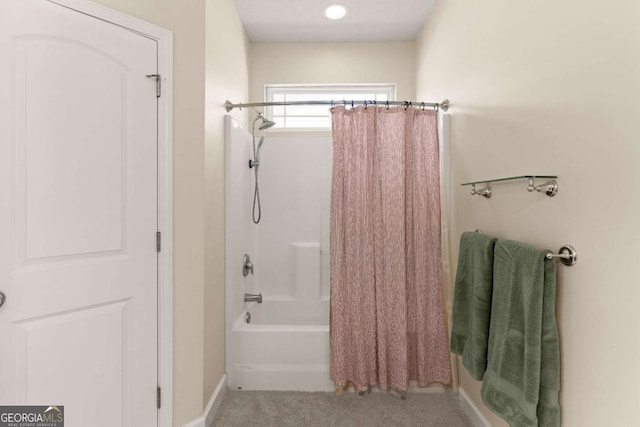 bathroom featuring shower / bathtub combination with curtain